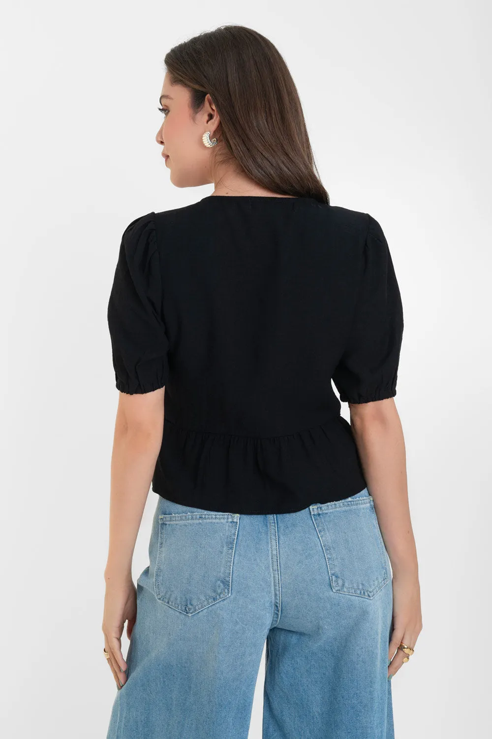 Blusa de cuello redondo con lazos peplum olanes