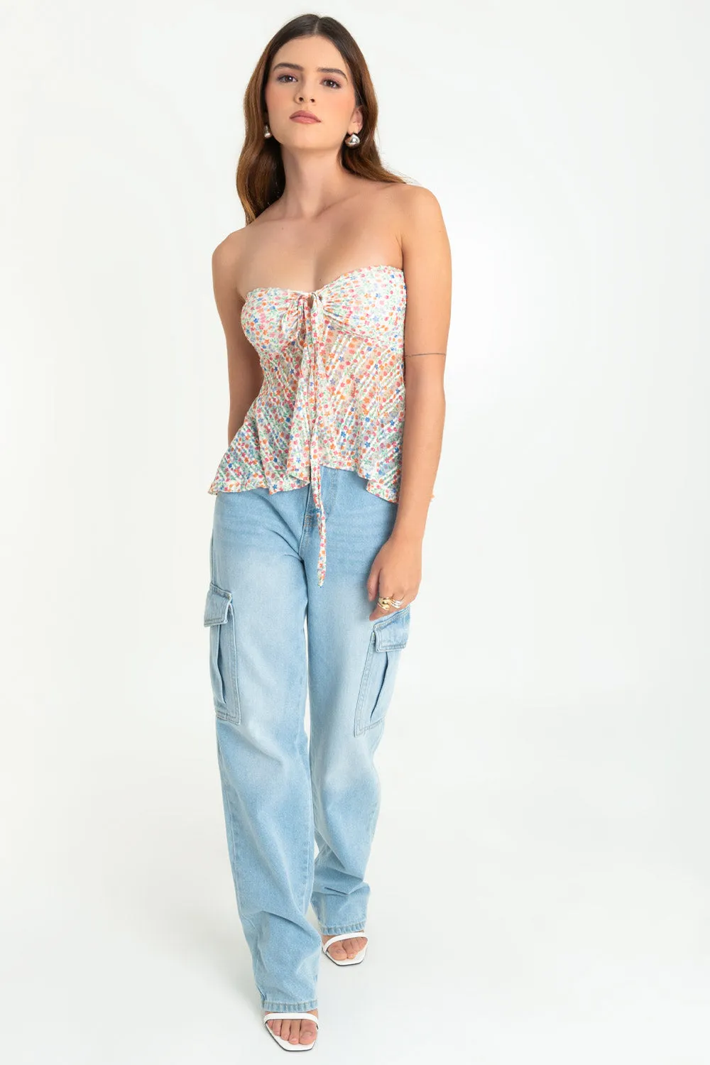 Top floral de mesh peplum con olanes