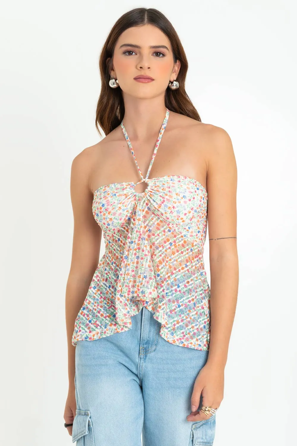 Top floral de mesh peplum con olanes